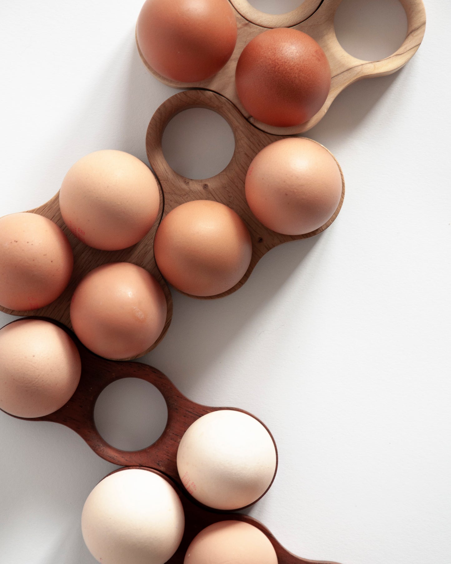 Nest - Playful egg storage in Sycamore, Oak and reclaimed Mahogany